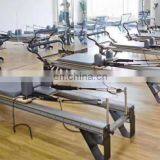 Лечебный комплекс оборудования. Индийский полу-трапециевидный столик, алюминиевская кровать с башней. Продается в Мельбурне. Прибор для пилатес-реформера thumbnail-5