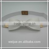 Bowknot elastic belt with metal plate and tetraena clasp