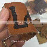 Customized Bulk Debossed Logo Genuine Leather Labels for Bags