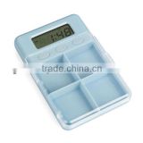 pill box with alarm timer 4 compartments .