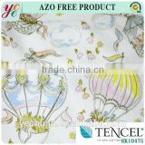 China wholesale flower style 100% tencel fabric for child clothes
