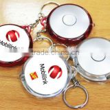 cheap round plastic led keychain with led light
