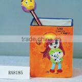 Cute Ceramic Orange Pencil Vase on Desk thumbnail-1