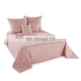 Cheap wholesale pink  polyester fabric quilted plain bedspread