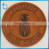 Zhejiang Credible Label Factory Produce Printing & Embossing Leather Patch Label for Women's Mortarboard Cap thumbnail-1