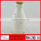 Ceramic Bottle With Wooden Lid thumbnail-1
