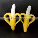European Standard Yellow-white Banana Shape Silicone Baby Toothbrush for Baby Chewing Supplier's Choice thumbnail-1