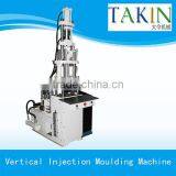 Vertical rubber injection molding machine