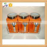 Ceramic Canister With Metal Spoon and Lid thumbnail-1