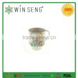 Ceramic tall mug with flower pattern and ring