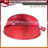 Red fire hose, flexible rubber hose with heavy duty hose clamps