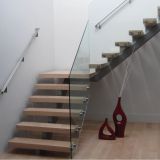the most fashionable floating steel staircase with wood step