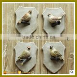 beautiful polyresin bird wall decoration , wall hook wholesale for living room                        
                                                                                Supplier's Choice