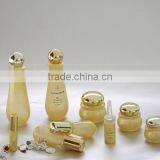 Glass Bottle and Cream Jar thumbnail-1