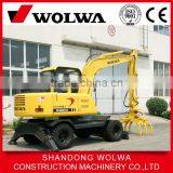 Small Wheel Grapple Loader With Back Fixed Leg and Front Blade thumbnail-1