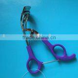 Purple colored plastic rubber bling eyelash curler
