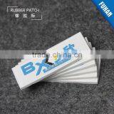 Embossed Custom White Background PVC Rubber Patch Logo