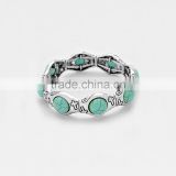 TURQUOISE ACCENT CROSS ETCHED STRETCH BRACELET