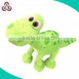 green cute stuffed dinosaur plush animal toy with spots