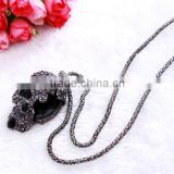 MYLOVE women necklace long chain half face skull pendant