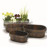 3-Ovals Burntwood Flower Barrels in Garden thumbnail-1