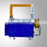 Full-automatic High Table Carton Packing/strapping Machine thumbnail-1