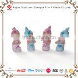 Polyresin Baby Sculpture With Chair Shoes Horse Photo Frame Leaf Holding Baby Figurine Resin Cute Baby Statue thumbnail-3