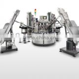 China fully auto wine bottle lid assembly machine
