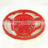 Oval Cast Iron Cooking Trivet With Teapot Shape