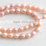 New 16 Inches 3-4mm Pink Rice Shape Freshwater Pearl Strand thumbnail-1