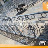 Decorative flowery wrought iron fence