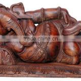 Reclining Ganesh Wooden Sculpture