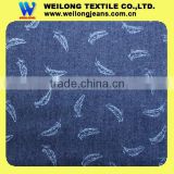 Q010-Y2 Foshan 100 cotton thin light feather printing denim jeans fabric