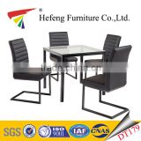 strong tube legs factory price tempered glass dining table with leather chair