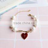 Cupid Arrow Love Bracelet Gold Arrow Red Enamel Cross Heart Charms Pearl Bead Link Bracelet thumbnail-2