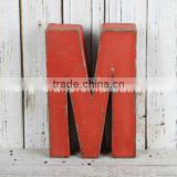 Wall mounted letter with distressed tin finish