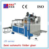 Semi automatic folding and gluing machine