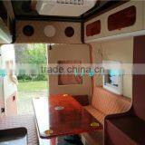 Low Price of mobile travel caravan/mobile home truck with table, sofas,TV,bed, kitchen, bathroom,A/C,etc