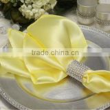 Polyester satin table napkin with ring for wedding, yellow color