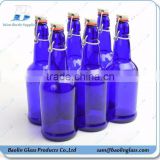 cobalt blue beer glass bottle with flip top