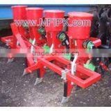 Planter with fertilizer attachment