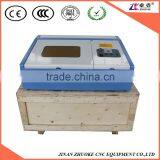 Mini CO2 Photo Laser Engraving Machine 40W 300*300mm 40W With Honey Comb Table Infrared Positioning System ZK-3030