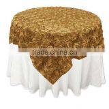 gold rossette table overlay for events