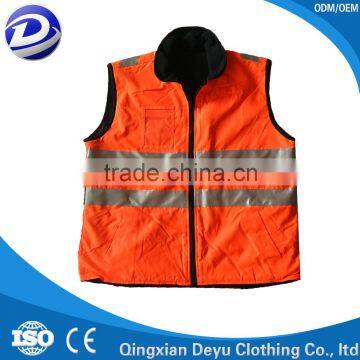 Reversible fluoresent safety vest