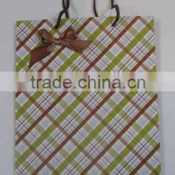 Black string printed gift bag with a bowknot