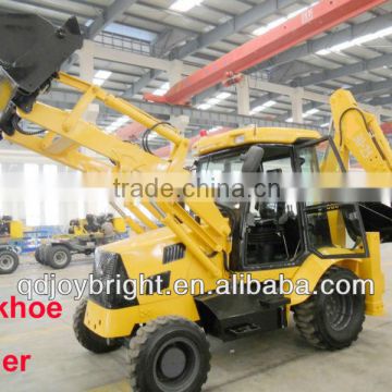 Backhoe loader with attachments