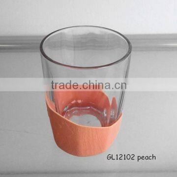 clear octogonal thick bottom glass tumbler with peach sleeve