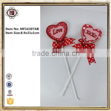 Cute metal heart stakes