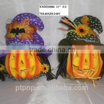 Paper scarecrow with pumpkin face for halloween decoration