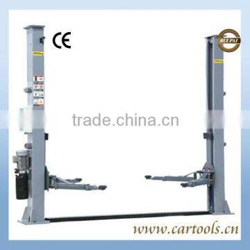 Floor plate electric release two post car lift